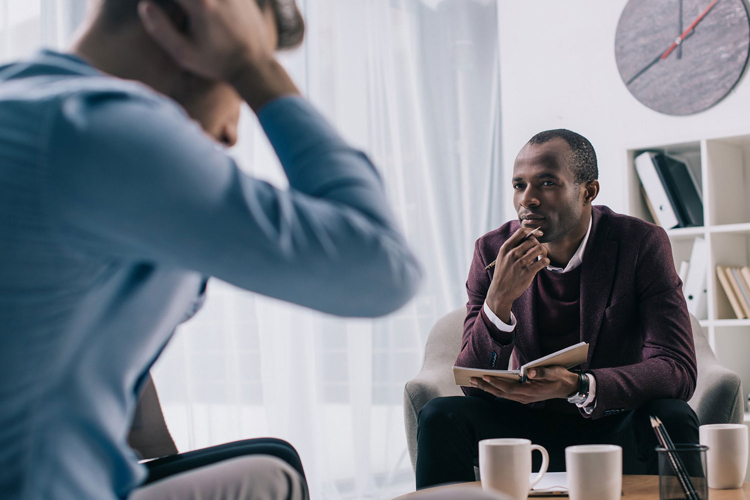 Man-Listening-to-Frustrated-Man